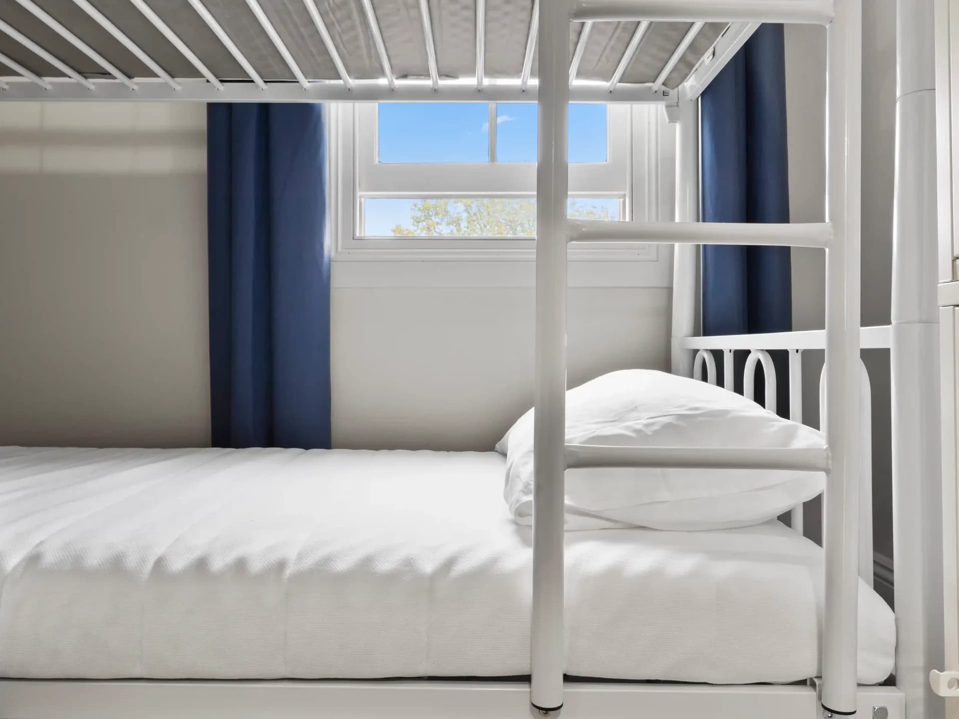 Azzurro pod bed with privacy curtain and clean bedding thumbnail