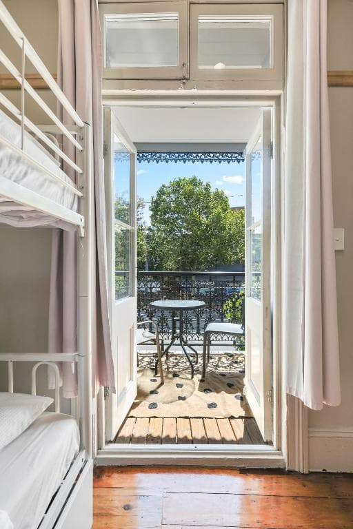 Mixed 2 Beds with Balcony (Shared Bathroom) — Photo 5